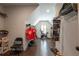 Walk-in closet with workout equipment with shelves for storage, as well as hardwood floors at 3825 Valleyway Rd, Cumming, GA 30040