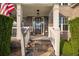 Charming home entrance with stone steps, white railings, and decorative wreath on door at 3825 Valleyway Rd, Cumming, GA 30040