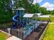 Fun playground with slides and climbing structures, surrounded by greenery at 3825 Valleyway Rd, Cumming, GA 30040