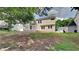 Expansive backyard view showcasing the home's exterior at 4954 Penscot Way, Stone Mountain, GA 30088