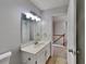 Bathroom featuring a single sink vanity and natural light at 4954 Penscot Way, Stone Mountain, GA 30088