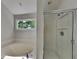Well-lit bathroom with a large soaking tub and a separate shower at 4954 Penscot Way, Stone Mountain, GA 30088