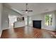 Inviting living room with beautiful wood floors, fireplace, and tons of natural light at 4954 Penscot Way, Stone Mountain, GA 30088