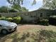 Charming home featuring a covered porch, well-maintained landscaping, and a welcoming facade at 6722 Heardsville Rd, Cumming, GA 30028