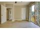 Bedroom featuring a private sliding glass door out to a private deck at 1149 Avondale Se Ave, Atlanta, GA 30312