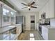 Bright kitchen featuring stainless steel appliances, white cabinets, and hardwood floors at 1149 Avondale Se Ave, Atlanta, GA 30312