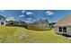 A large fenced backyard provides privacy and plenty of space for outdoor activities at 5136 Estonian Dr, Fairburn, GA 30213