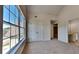 Vaulted bedroom featuring large window and walk-in closet at 5136 Estonian Dr, Fairburn, GA 30213