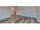 Inviting living room showcasing stylish flooring, creating a cozy and modern atmosphere at 5136 Estonian Dr, Fairburn, GA 30213