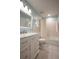 Bathroom featuring a white vanity, light blue walls, and shower with curtain at 5322 Seaton Dr, Atlanta, GA 30338