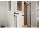 Tiled shower in updated bathroom with towel rack and plenty of natural light at 5322 Seaton Dr, Atlanta, GA 30338