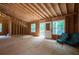 Large unfinished bonus room with natural light and wooden frame perfect for customization at 5322 Seaton Dr, Atlanta, GA 30338