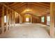 Large unfinished bonus room with natural light and wooden frame perfect for customization at 5322 Seaton Dr, Atlanta, GA 30338