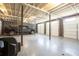 Spacious garage with epoxy floors, multiple doors, and ample space for parking at 5322 Seaton Dr, Atlanta, GA 30338