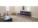 Bright play room with neutral walls, finished concrete floors, and ample space for  at 5322 Seaton Dr, Atlanta, GA 30338