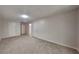 Spacious basement with access to a bathroom, and utility closet at 700 Patriots Point St, Locust Grove, GA 30248