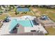 Overhead view of community pool and playground amenities with tennis courts in the background at 126 Oakleigh Pointe Dr, Dallas, GA 30157