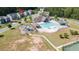 Aerial view of community amenities, including a pool, playground, and clubhouse at 126 Oakleigh Pointe Dr, Dallas, GA 30157