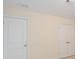 Bedroom featuring a closet and two doors, offering ample storage and accessibility at 126 Oakleigh Pointe Dr, Dallas, GA 30157