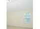 Bright bedroom with a large window providing natural light and neutral carpeting at 126 Oakleigh Pointe Dr, Dallas, GA 30157