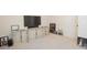 Bonus room features large flat screen and modern entertainment center at 126 Oakleigh Pointe Dr, Dallas, GA 30157