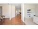 Bright foyer showcasing hardwood floors and an open layout to other living spaces at 126 Oakleigh Pointe Dr, Dallas, GA 30157