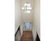 Bright foyer with hardwood floors, a modern chandelier, and large front door at 126 Oakleigh Pointe Dr, Dallas, GA 30157