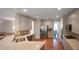 Open-concept kitchen with stainless steel appliances, granite countertops, and gray cabinetry at 126 Oakleigh Pointe Dr, Dallas, GA 30157