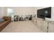 This entertainment room features a flat screen TV and media center at 126 Oakleigh Pointe Dr, Dallas, GA 30157