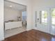 Spacious office featuring a large desk, ample natural light, and hardwood floors at 126 Oakleigh Pointe Dr, Dallas, GA 30157