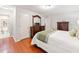 Spacious bedroom with hardwood floors, ample closet space, and ensuite bathroom at 1260 Willeo Creek Dr, Roswell, GA 30075