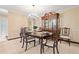 Elegant dining room featuring a chandelier, a china cabinet, and seating for six at 1260 Willeo Creek Dr, Roswell, GA 30075