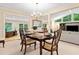Formal dining room featuring a chandelier, setting an elegant scene for dinner gatherings at 1260 Willeo Creek Dr, Roswell, GA 30075