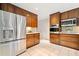 Updated kitchen with modern appliances, ample counter space, and stylish cabinetry at 1260 Willeo Creek Dr, Roswell, GA 30075