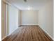 A spacious room featuring laminate flooring, recessed lighting, and neutral walls at 3084 Fern Valley Sw Dr, Marietta, GA 30008