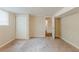 Finished basement bedroom features neutral walls, carpet, and a closet for storage at 3084 Fern Valley Sw Dr, Marietta, GA 30008