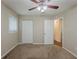Bedroom featuring plush carpet, ceiling fan, and neutral walls at 3084 Fern Valley Sw Dr, Marietta, GA 30008