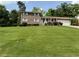 Charming brick home with a well-manicured lawn and inviting curb appeal at 3662 Greentree Farms Dr, Decatur, GA 30034