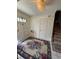 Inviting foyer featuring a decorative rug, chandelier, and staircase to the upper level at 3662 Greentree Farms Dr, Decatur, GA 30034