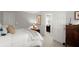 Serene bedroom showcasing a comfortable bed, neutral tones, and a convenient doorway to another room at 40 Ivy Chase Ne, Atlanta, GA 30342