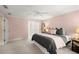 Spacious bedroom with neutral walls, soft carpet, and multiple doorways, offering ample space and functionality at 40 Ivy Chase Ne, Atlanta, GA 30342