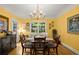 Bright dining room featuring a chandelier, hardwood floors, and space for entertaining at 40 Ivy Chase Ne, Atlanta, GA 30342