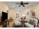 Spacious living room with hardwood floors, neutral paint, and easy access to the kitchen and outdoor patio at 40 Ivy Chase Ne, Atlanta, GA 30342