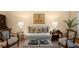 Well-decorated living room showcasing hardwood floors and cozy seating arrangements at 40 Ivy Chase Ne, Atlanta, GA 30342
