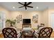 Cozy living room with a ceiling fan, neutral paint, hardwood floors, and decorative wall hangings at 40 Ivy Chase Ne, Atlanta, GA 30342