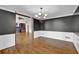 Elegant dining room featuring hardwood floors and crown molding at 5950 Meadow Brook Ln, Cumming, GA 30040