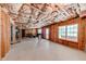 Unfinished basement offering an expansive layout, exposed insulation, and a framed exterior door at 1265 Kelly Nelson Dr, Lawrenceville, GA 30043