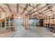 Unfinished basement area with exposed studs, insulation, concrete floor, and potential for customization at 1265 Kelly Nelson Dr, Lawrenceville, GA 30043