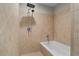 Luxurious walk-in shower with a rainfall shower head and tile surround at 1271 Ponti Nw Mews # 92, Atlanta, GA 30318