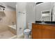 Modern bathroom with soaking tub, shower, and sleek vanity at 1271 Ponti Nw Mews # 92, Atlanta, GA 30318